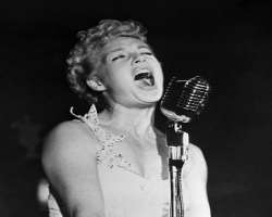 She was also a dancer and singer. As a singer, she dropped her first song in 1939 titled Old Man Mose.
